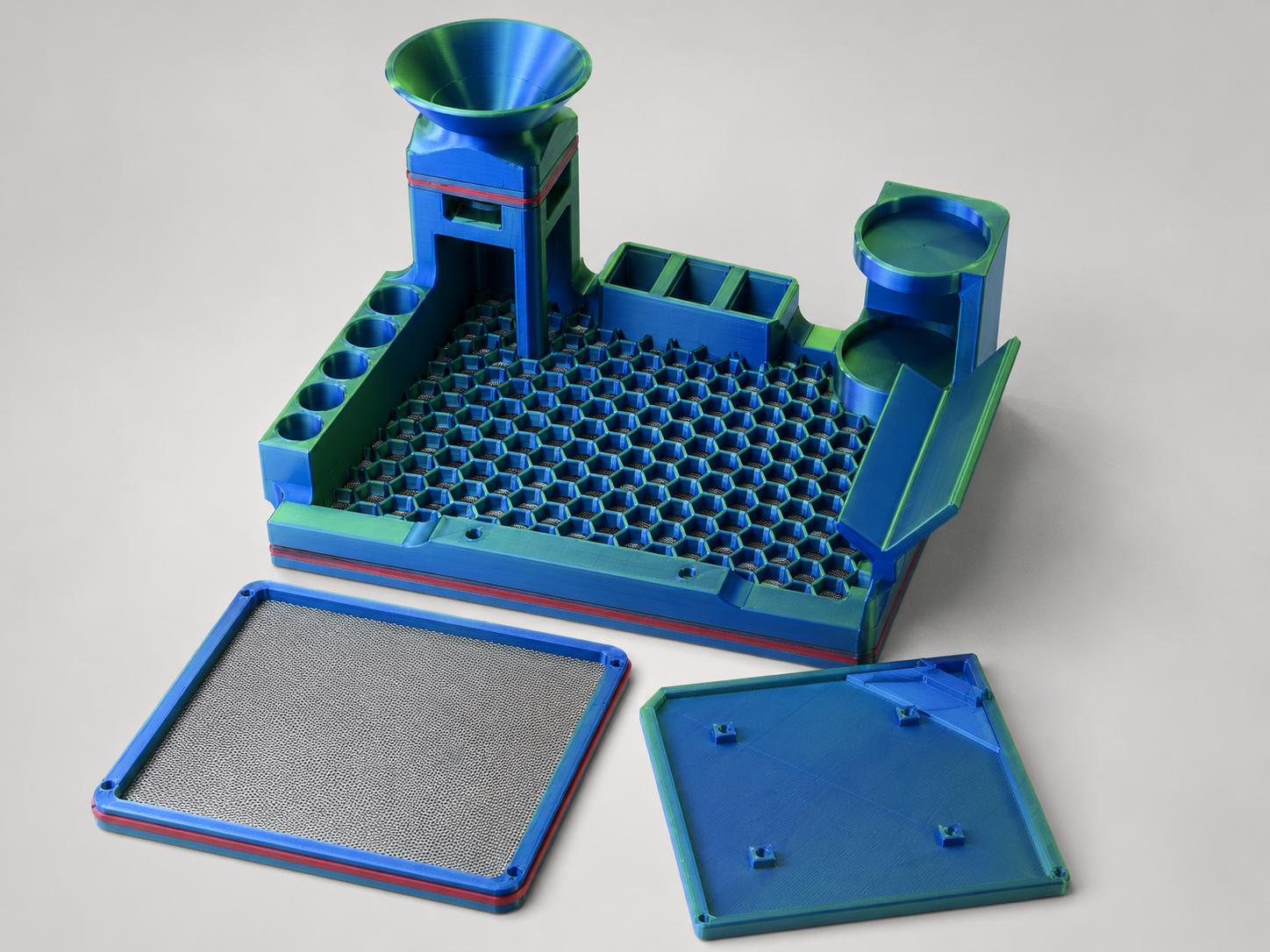 Exploded parts view of Modular Screen Tray showing main tray, removable stainless steel mesh screen insert, and removable fine catch tray